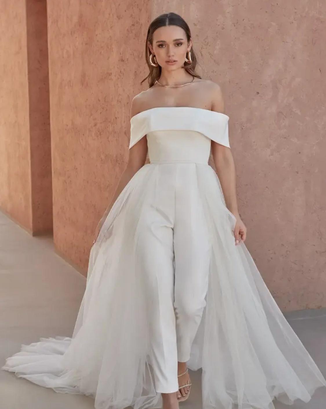 Model wearing white Adore dress