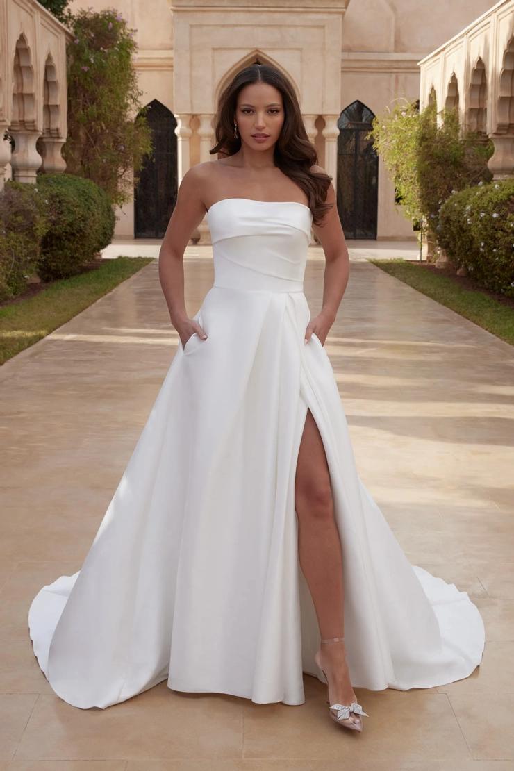Model wearing white Sincerity dress